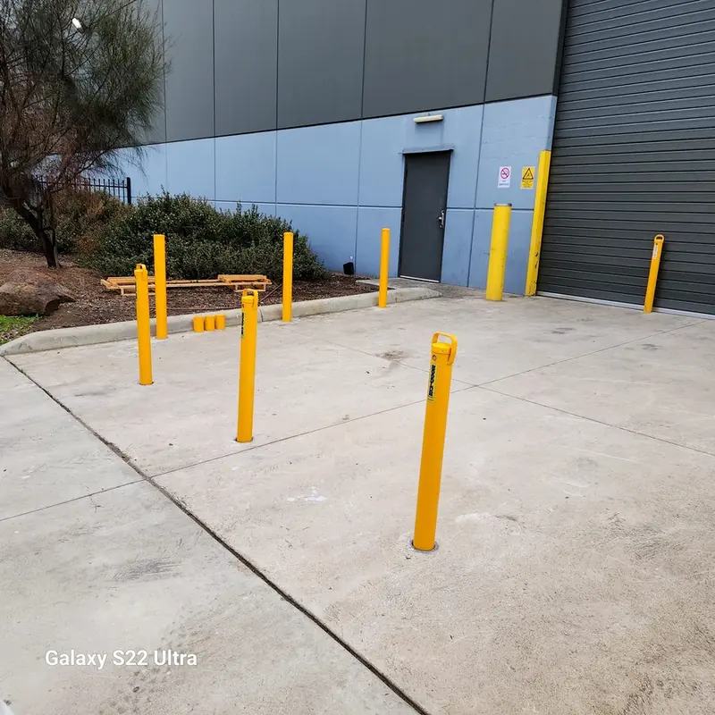 Yellow bollards — warehouse entry
